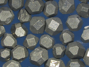 Diamond saw grit synthetic coating titanium